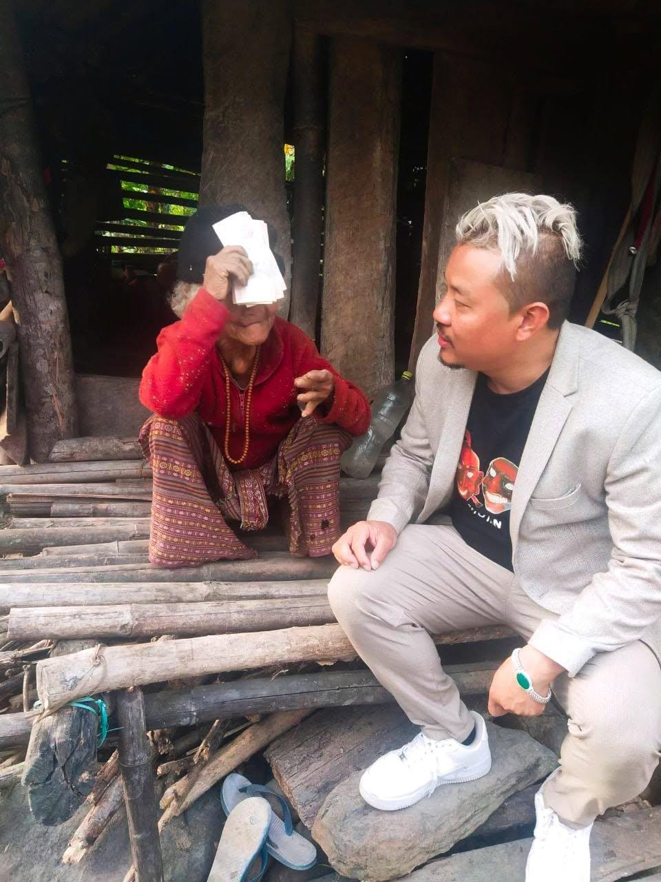 Karma Kelvin visiting an elderly community member